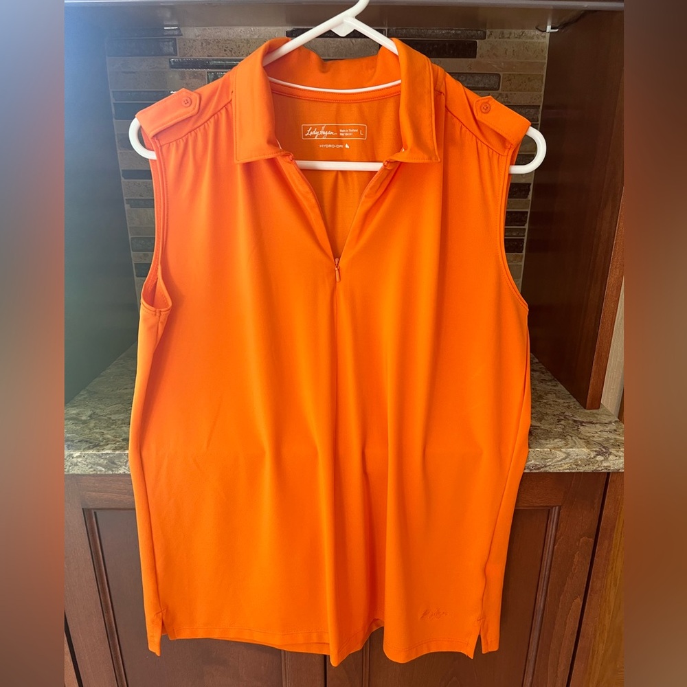 Lady Hagen Orange Sleeveless Polo Top
